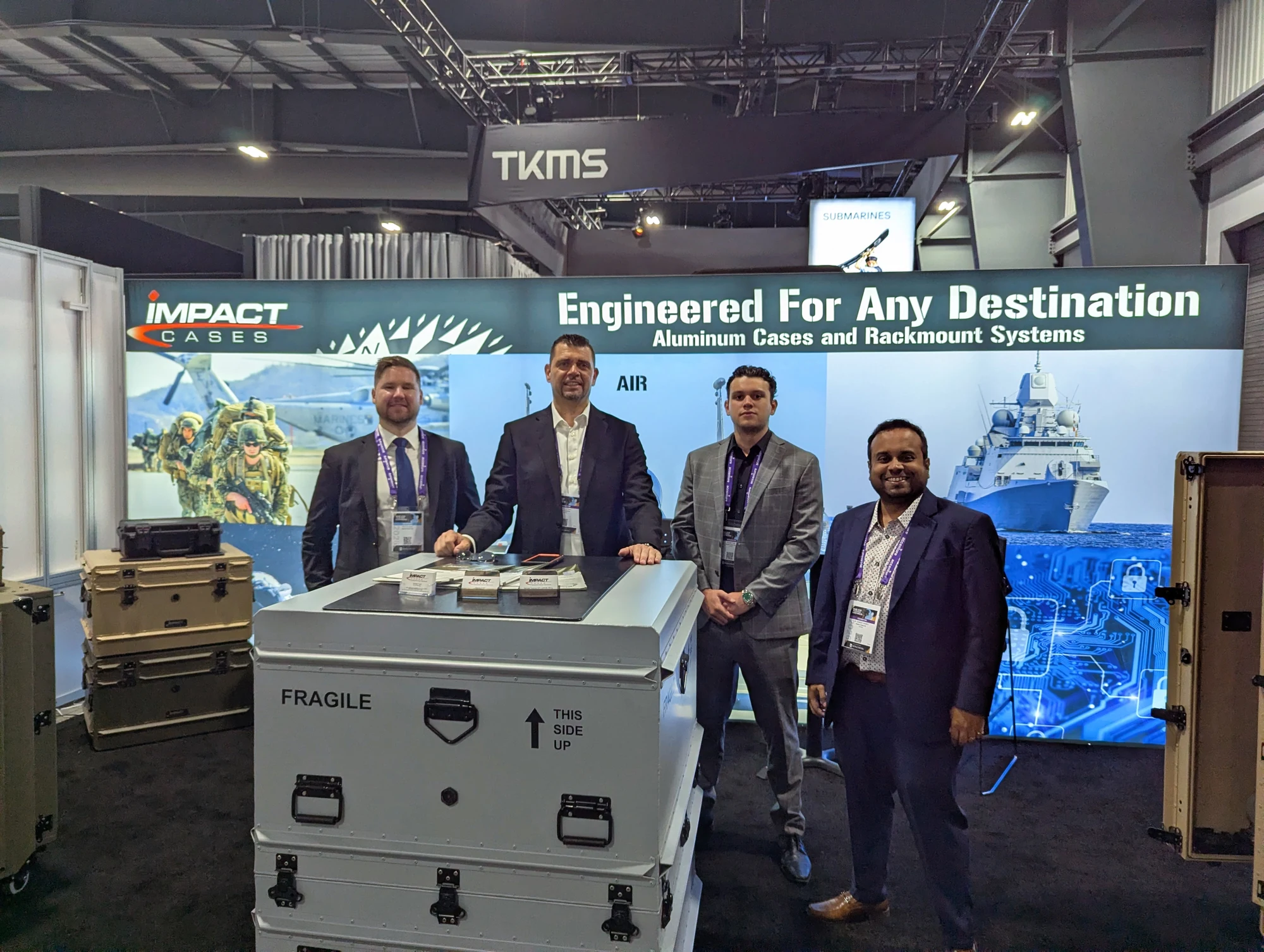 Impact Cases team on the floor at CANSEC 2026, EY Centre Ottawa