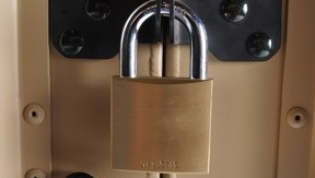 Stainless steel padlock hasp with padlock on Target case lid