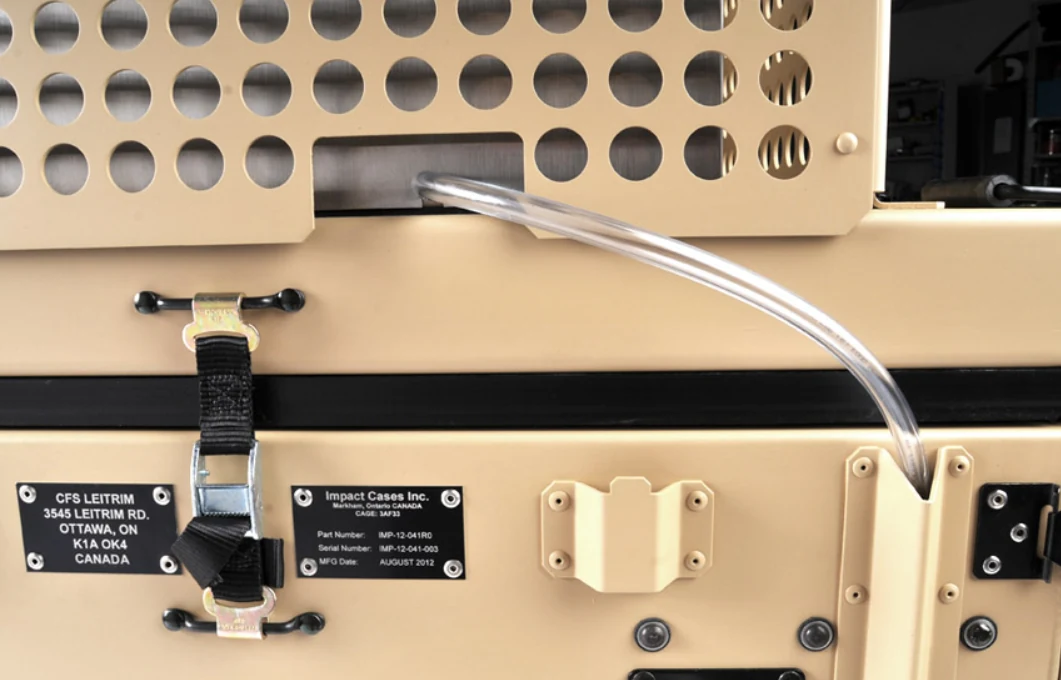 Target Climate Control System (CCS) deployed unit detail, condensate drain and ID plates